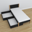 Letto nero-quercia con cassetto in legno – vista diagonale