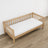 Natural pine sofa bed in a child’s room – scandi arrangement, wooden
