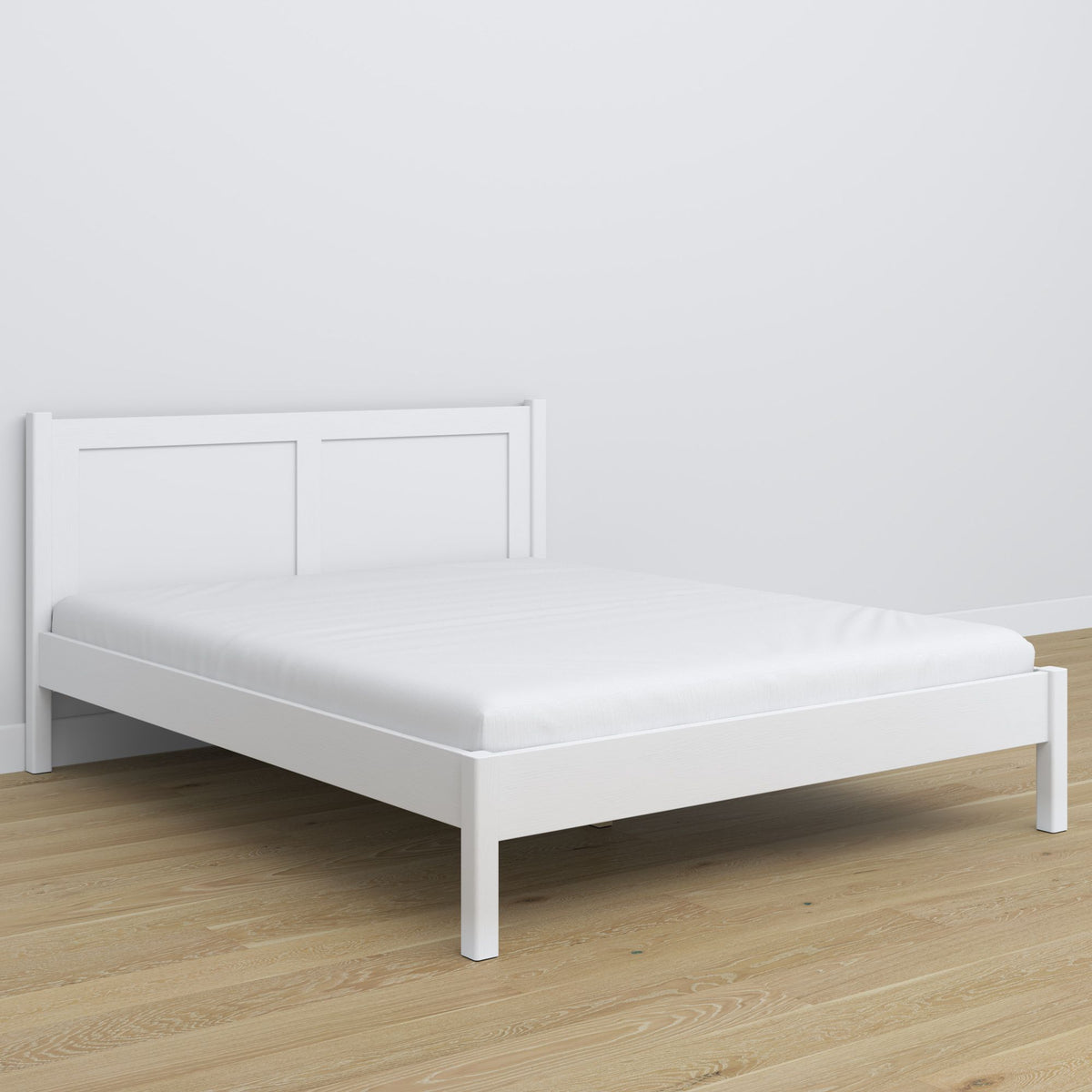 Lit double en bois blanc – pieds et base, gros plan sur les détails