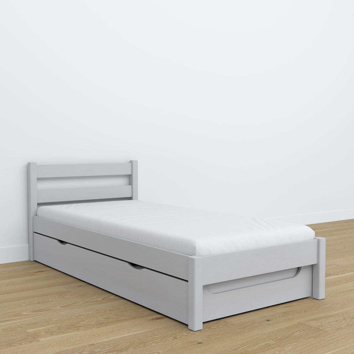 Letto con cassetto per materasso in legno grigio – allestimento nella cameretta dei bambini