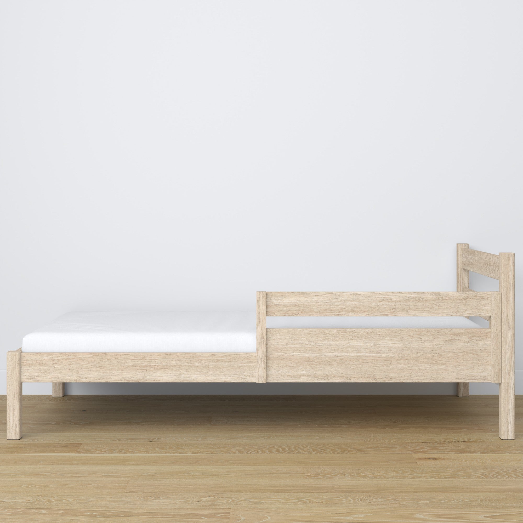 Wooden safety rail bleached oak in children’s bed – scandi arrangement
