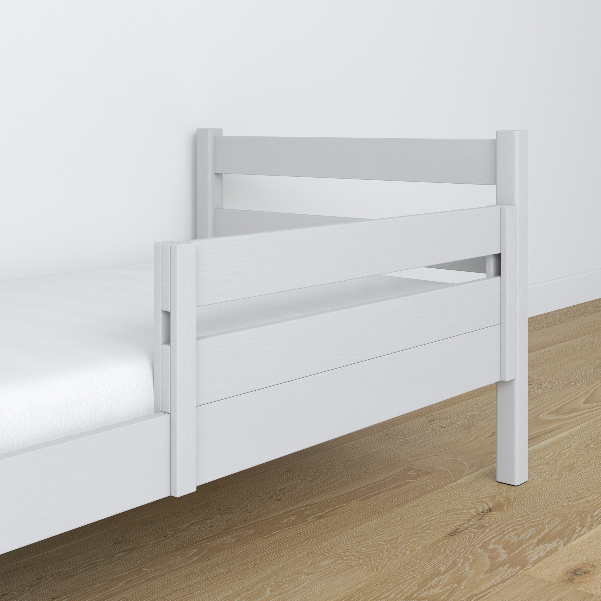 Sponda di protezione in legno grigio nel letto per bambini – allestimento scandi