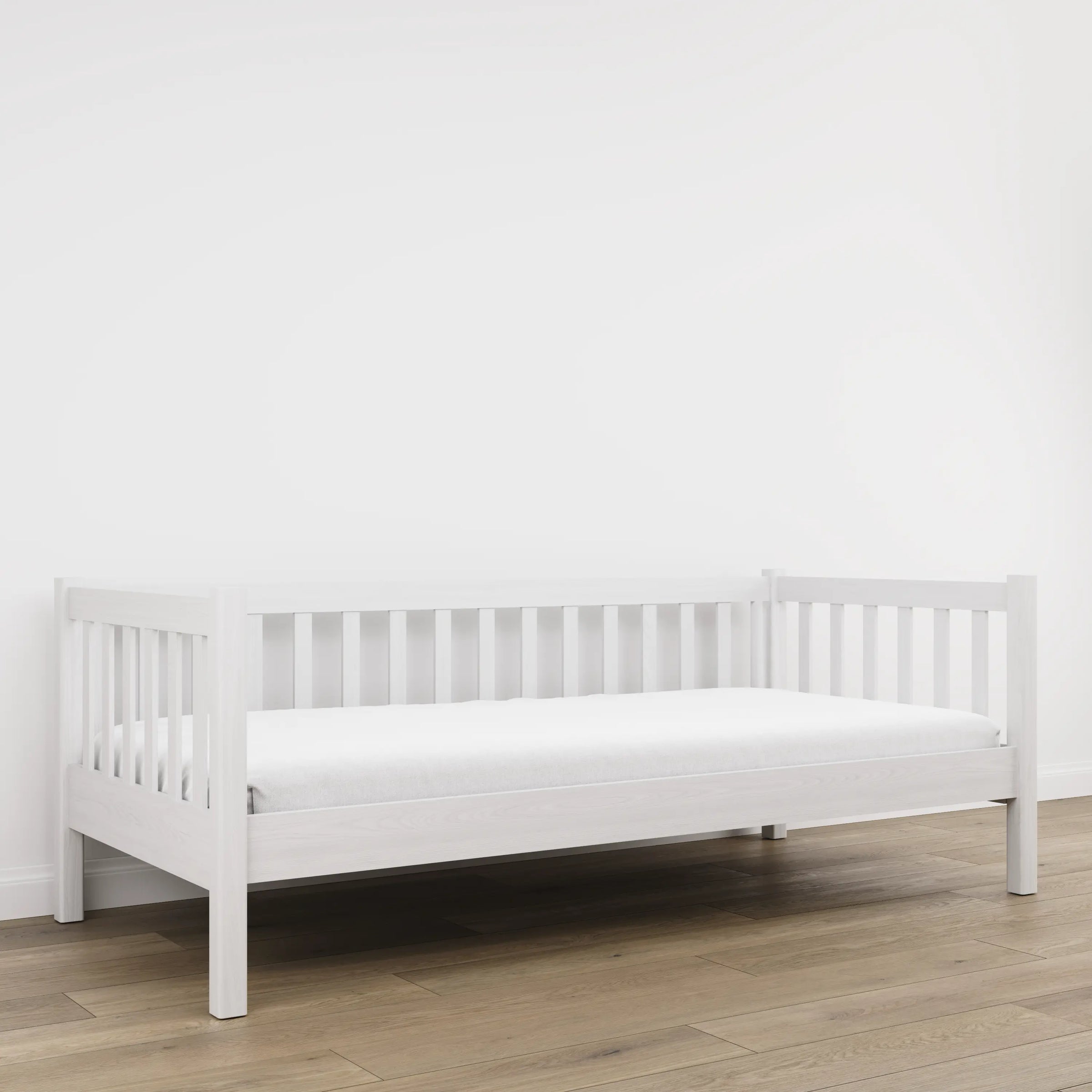Letto divano bianco – laterale sponda in legno, sicurezza per bambini